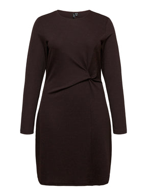 The Vero Moda Curve Kanva Dress in Chocolate, dark brown long-sleeve knit dress with a twisted waist detail, shown on a plain white background.