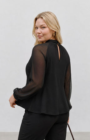 Vero Moda Curve Molly Blouse in Black. This image was created using AI

