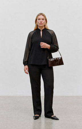 Vero Moda Curve Molly Blouse in Black . this image was created using AI

