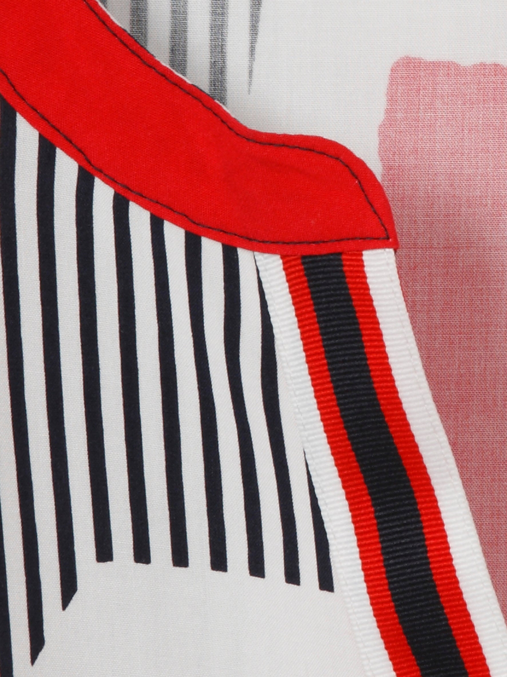 V neck blouse, long buttoned cuffs, white and navy stripe with a red floral print