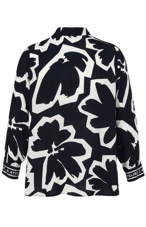 Navy and white floral patterned shirt