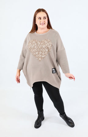  Zara Floral Heart Sweater in Taupe. This image was created using AI.    