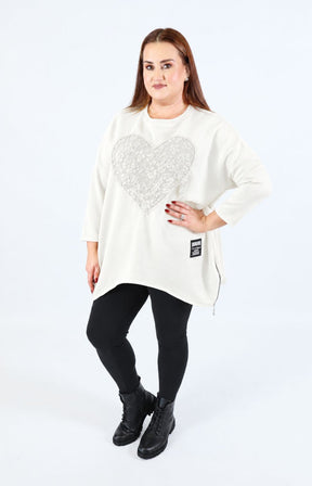 Zara Floral Heart Sweater in White. This image was created using AI.   