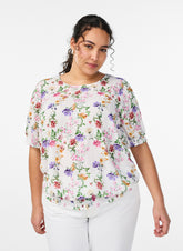 Zizzi Maeve Blouse with Wild Flowers, a smocked blouse with an all over floral print with short sleeves
