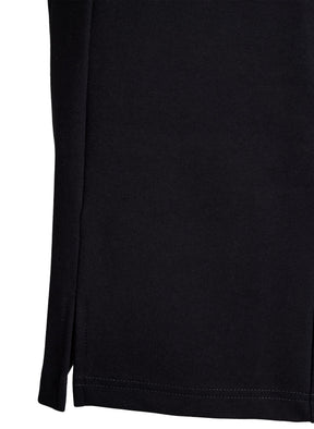 Close-up of the Zizzi Olia Skirt in Black, a black long-sleeve garment showing the side seam and hem stitching against a white background.